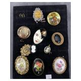 Collection of lovely brooches of different styles: