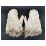 Old pair of caribou skin mittens, old and used