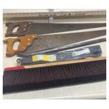 Hand saws, mower blades, pry bar