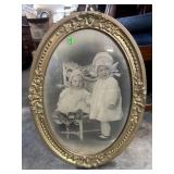 ANTIQUE OVAL FRAMED CHILDS PORTRAIT