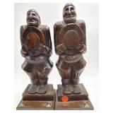 HEAVILY WOOD CARVED MEN HOLDING HATS