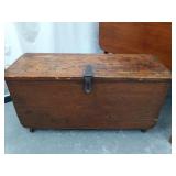 Early Dovetailed chest on casters, iron handles