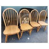 4 bow Back chairs.   Made in Yugoslavia.   Look