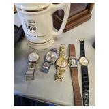 6 Wrist watches  and  UPS  mug, 2 UPS watches 1