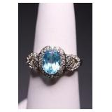 STERLING OVAL CUT BLUE TOPAZ RING, LAB GROWN