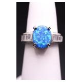 Oval cut blue opal ring, lab grown