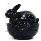 Black glass bunny on nest