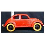 Red cast iron VW beetle car