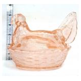 Pink glass hen on nest