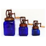 Trio blue glass butter churns