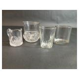 Three Glass Cups and One Glass Small Pitcher