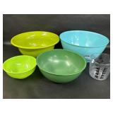 Blue and Green Bowls and Measuring Cup