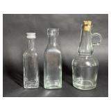 Three Various Shaped Glass Bottles