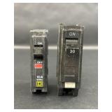 Two 20 Amp Circuit Breakers