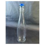 Clear glass Bottle With Blue Stopper