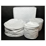 Four Plastic Quilted China Storage Containers