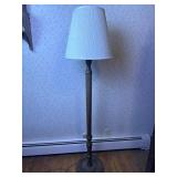 Wood base floor model lamp.