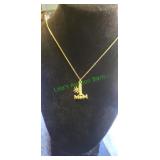 Gold tone number 1 mom pendant and necklace