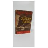 THE CURTAIN RISES  1ST EDITION
