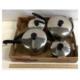 4 pots and pans with lids