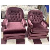 2 purple colored, swivel rocking chairs