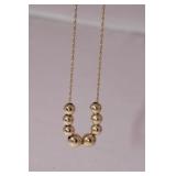 14kt yellow gold 24" Chain w/ 8 hollow gold beads