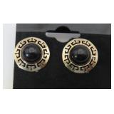 A pair of Black Onyx in 14kt gold w/ a Greek Key