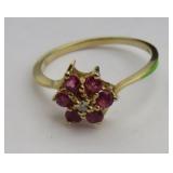 14k size 6 Ring with Diamond center and 6 pink