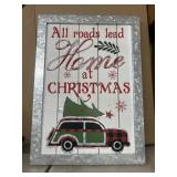 "All Roads Lead Home at Christmas" lighted sign