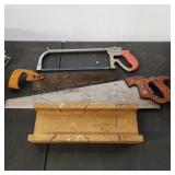 3 hand saws and miter box