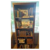 Tall wooden bookshelf (contents not included)