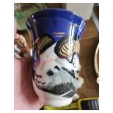 Painted ceramic cup with native decor