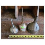 Vintage oil cans and funnel