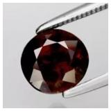 1.48ct 6.5mm Round Natural Orangish Red Spessartit