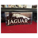 Jaguar Stained Glass Sign-Bent and cracked