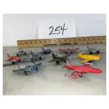 Vtg. Metal toy airplanes