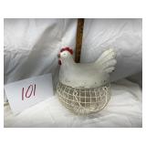 Ceramic hen on handled wire egg basket