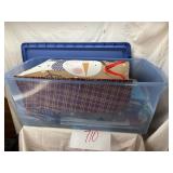 Large tote loaded with holiday gift bags and