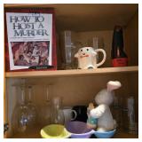 Contents of Cabinet w/ Easter & Ghost Mug