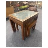 Three green top nesting tables