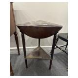 Small triangular drop leaf table