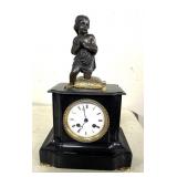 Figural Black Metal & Gilt Mantle Clock