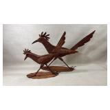 pair of metal roadrunner sculptures Yard art