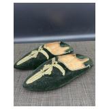 Pair of green velvet Moroccan slippers