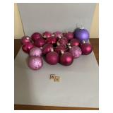 Assortment of pink and purple ornaments