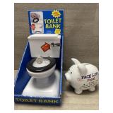 (2) Coin Banks - NOS Toilet Bank & Face Lift