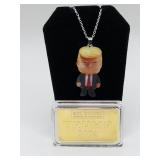 Trump Necklace and Gold Bar