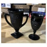 TWO BLACK GLASS VASES