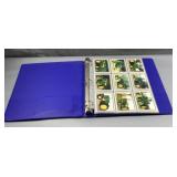 Binder of John Deere tractor cards