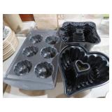 COLLECTION OF METAL MUFFIN PANS - WILTON